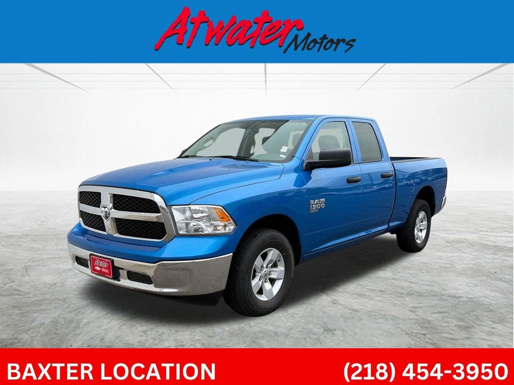 2024 RAM 1500 Classic SLT in Blue — front three-quarter view