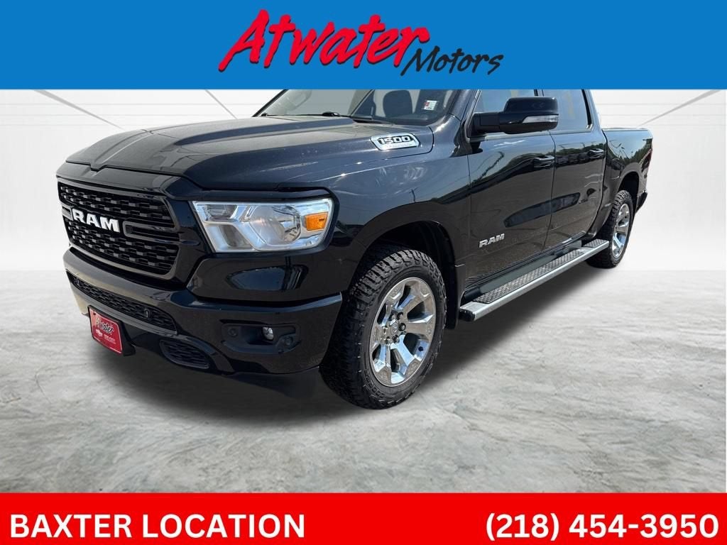 2022 RAM 1500 Big Horn in Black — front three-quarter view