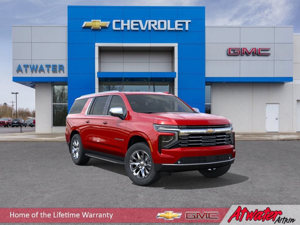 2026 Chevrolet Suburban Premier in Radiant Red Tintcoat — front three-quarter view
