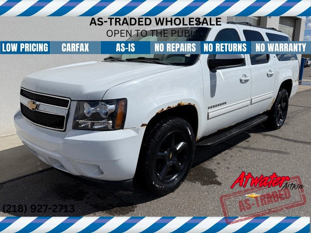 2011 Chevrolet Suburban LT in Summit White — front three-quarter view