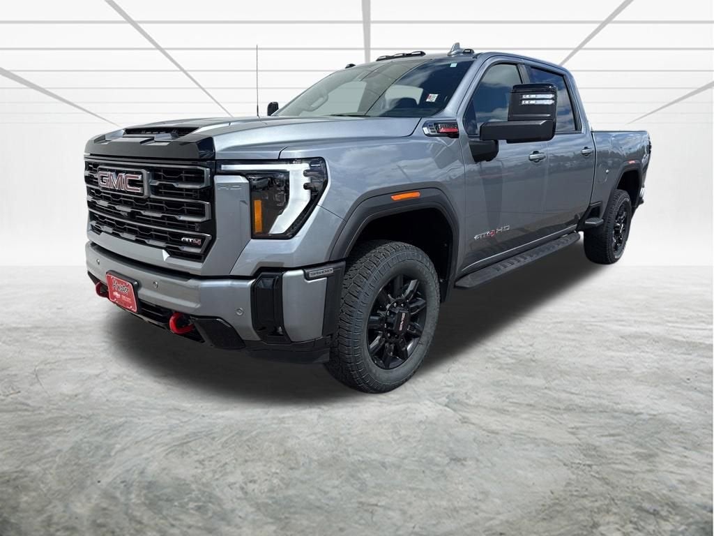 2025 GMC Sierra 3500 HD AT4 in Sterling Metallic — front three-quarter view